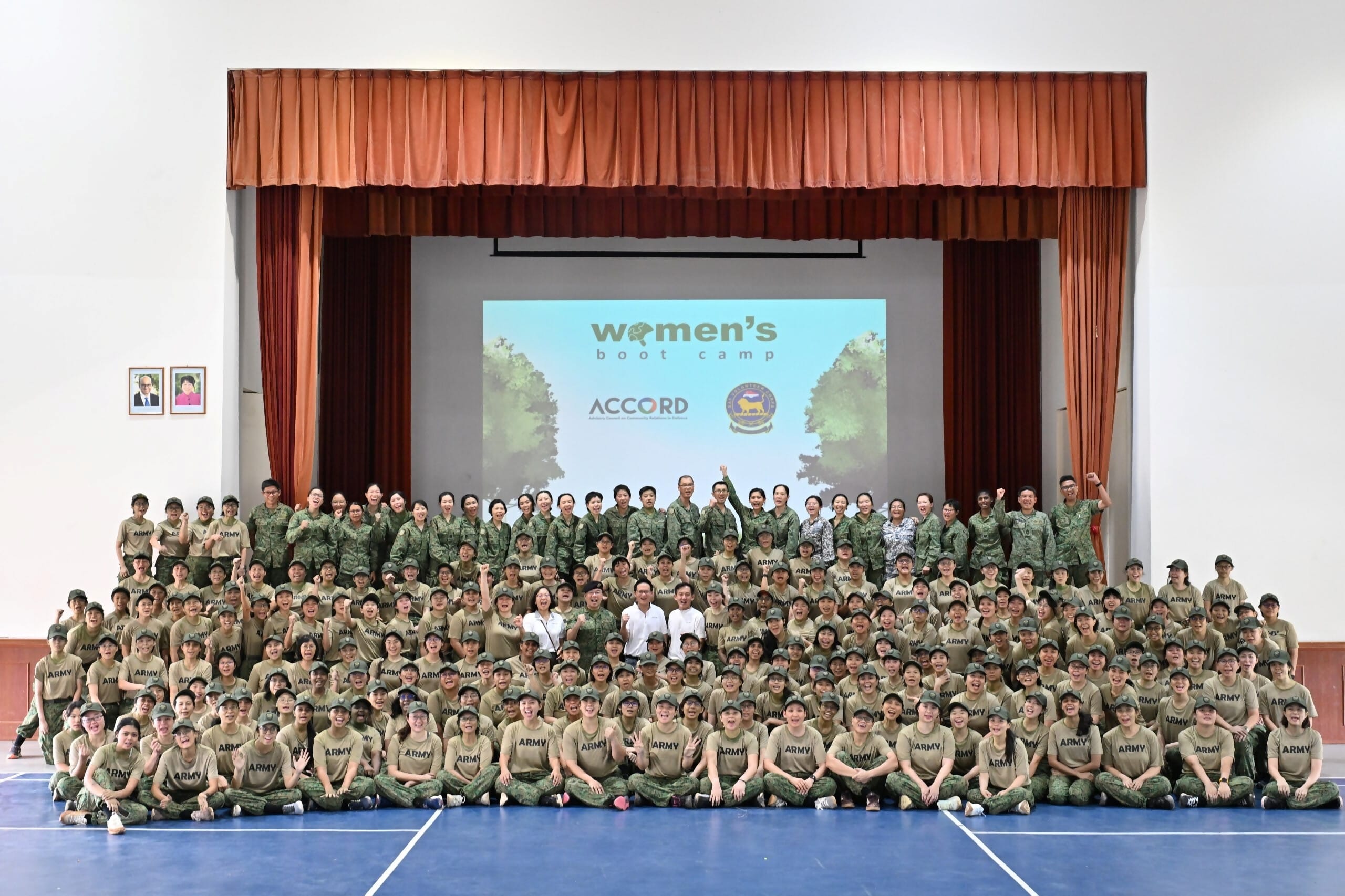 Minister of State (MOS) for Defence Mr Desmond Choo taking a group photo with the Women’s Boot Camp 2025 (WBC25) participants.